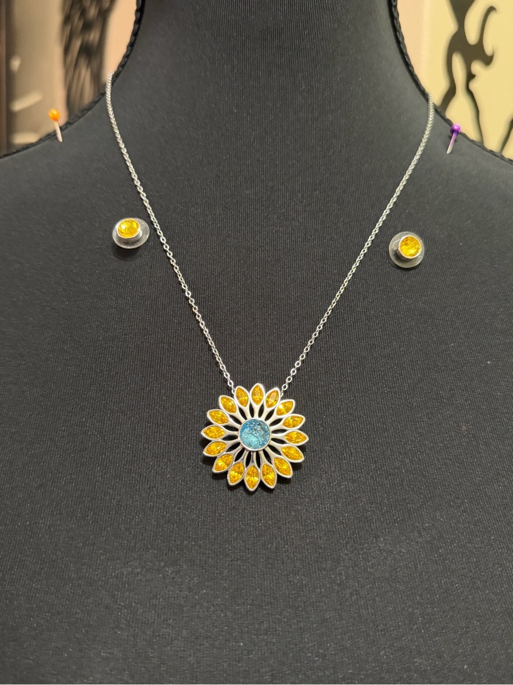 Touchstone Crystal Sunflower Necklace with yellow stud earrings